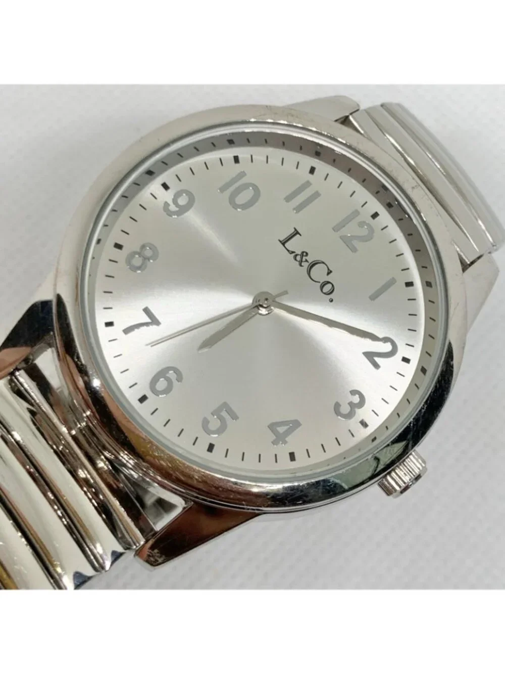 L&Co silver tone men’s watch 40mm quartz analog stretch band 7.5” running